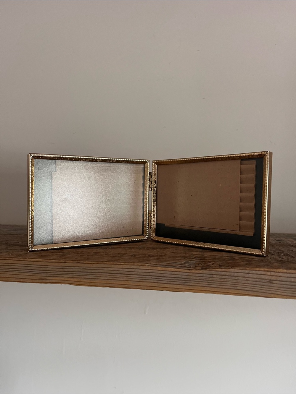 Small double hinged vintage metal photo frame